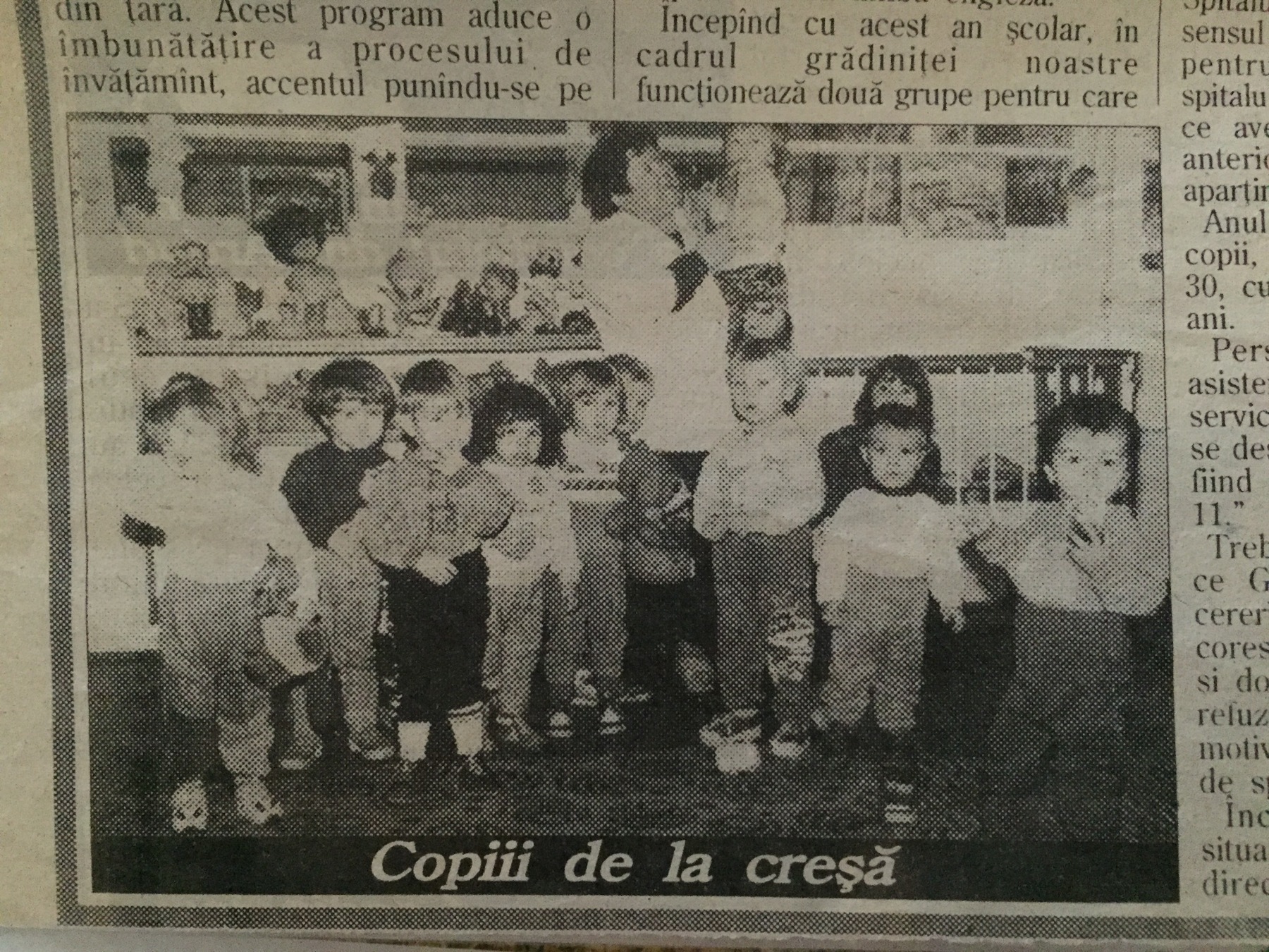 Childhood newspaper photograph of a nursery group; Mihaela has identified herself as the child on the far left