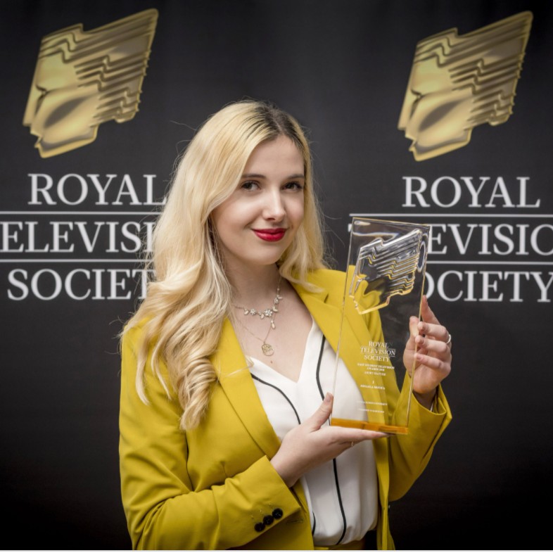Mihaela Motica holding her Royal Television Society award